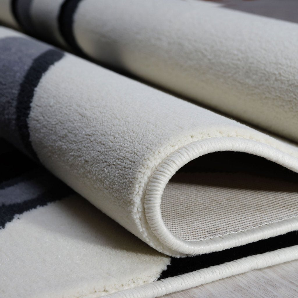 Calvin Cream Abstract Area Rug -