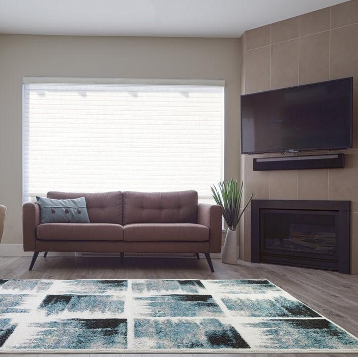Kensington Teal Ivory Abstract Area Rug -