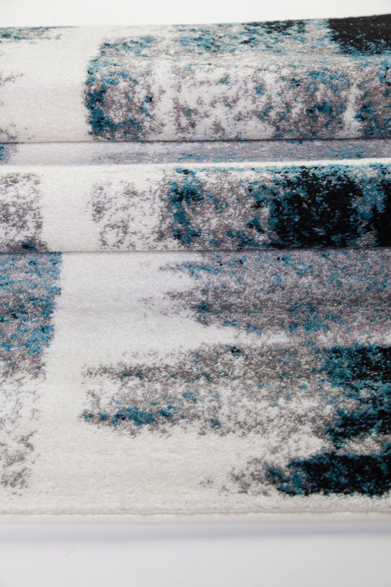 Kensington Teal Ivory Abstract Area Rug -